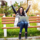 Young Female Employee excited looking at her laptop.