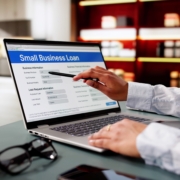 Laptop displaying small business financing options comparing working capital loans vs. line of credit.