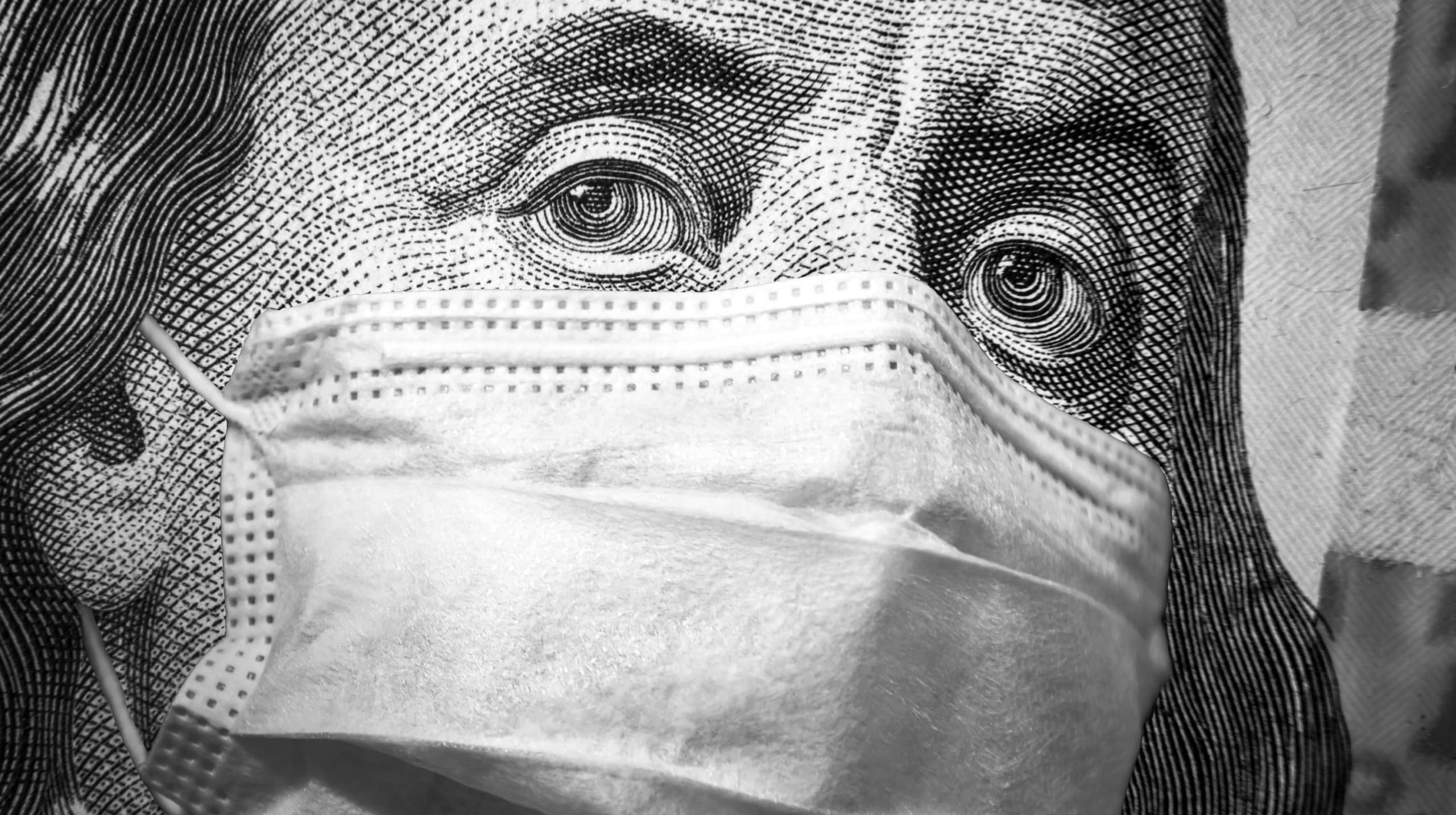 Benjamin Franklin wears mask to symbolize the pandemic in America.